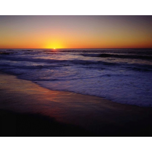 CA, San Diego, A beach on the ocean at Sunset